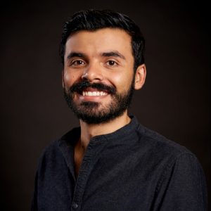 This is important because his warm smile and confident pose reflect the positivity and trust I feel in this moment.